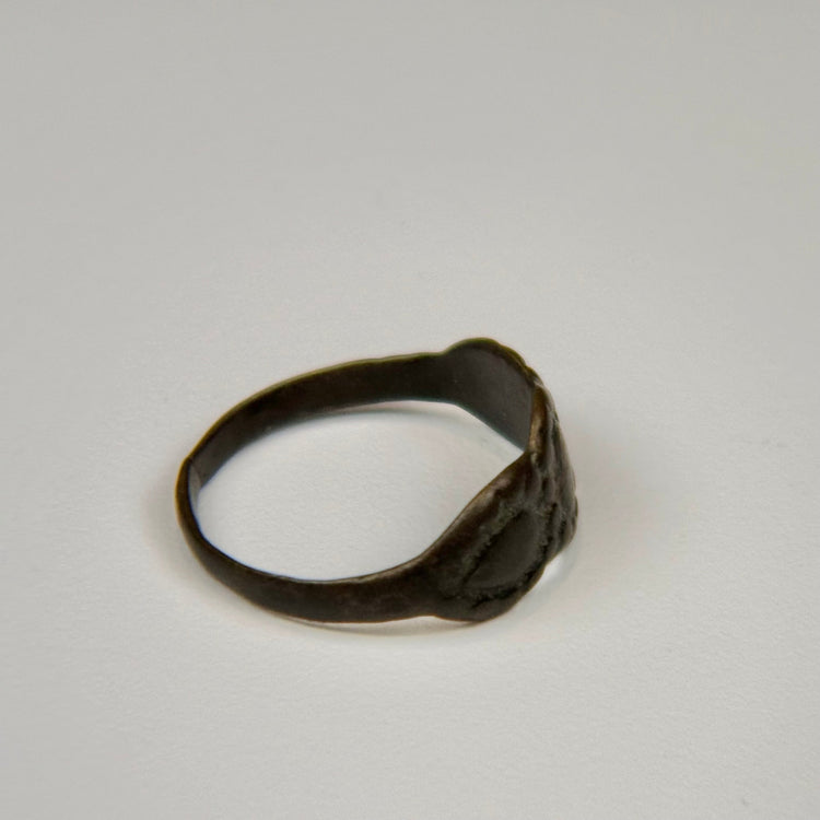 Late Roman to Byzantine silver ring with triple oval motif and handcrafted rounded band