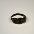 Byzantine period silver ring featuring a sculptural cluster of three oval-shaped motifs