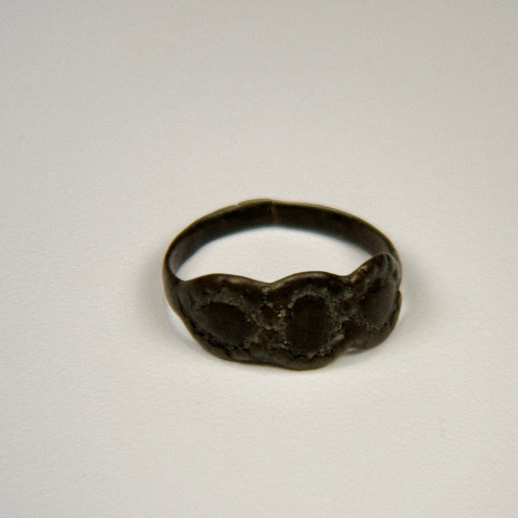 Byzantine period silver ring featuring a sculptural cluster of three oval-shaped motifs