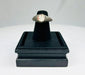Antique silver ring with polished carnelian gemstone and engraved design