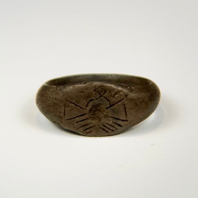 Ancient silver signet ring with domed bezel, sunburst engraving, and natural aged patina