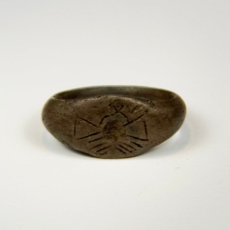 Ancient silver signet ring with domed bezel, sunburst engraving, and natural aged patina
