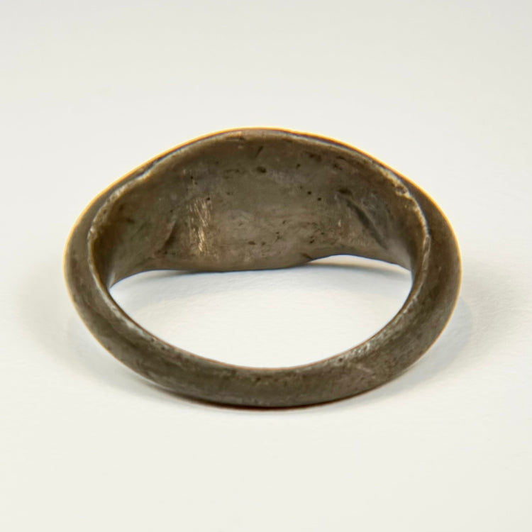 Ancient Late Roman silver signet ring with engraved sunburst motif, circa 200–500 CE