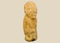 Ancient Sokoto terracotta figurine, West Africa, circa 500–200 CE, hand-modeled clay figure with stylized features and weathered patina, mounted on a display stand.