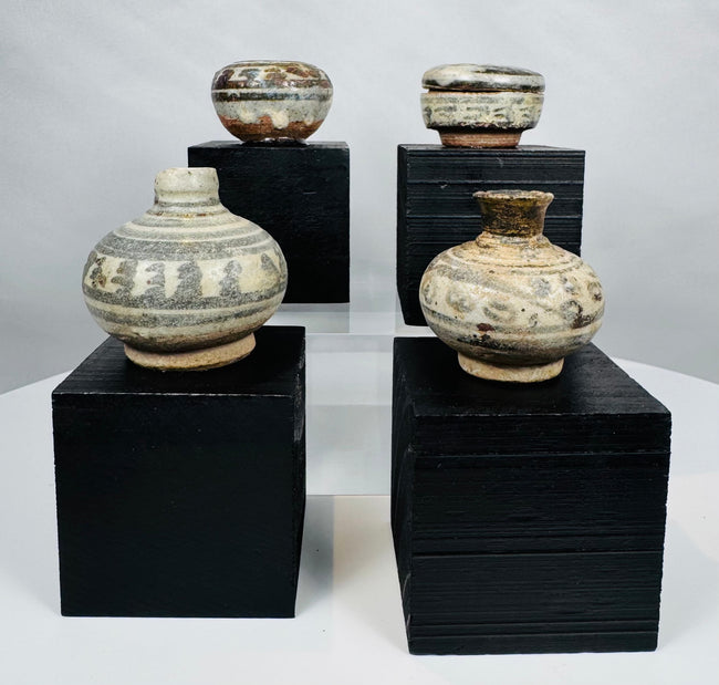 Authentic Sukhothai Kingdom stoneware vessels with celadon-like glaze tones and decorative iron-black painted patterns.