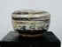 Authentic Sawankhalok export ware group featuring four miniature glazed vessels from the Sukhothai Kingdom of Thailand.