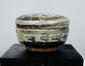 Authentic Sawankhalok export ware group featuring four miniature glazed vessels from the Sukhothai Kingdom of Thailand.