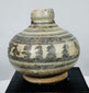 Medieval Thai glazed stoneware vessels with hand-painted geometric and floral designs characteristic of Sawankhalok ceramic production.