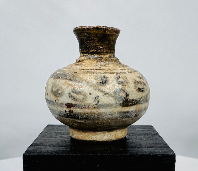 Collection of four miniature Sukhothai Period stoneware jars and containers showcasing traditional Sawankhalok kiln craftsmanship.