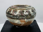 Ancient Southeast Asian ceramic vessels with underglaze iron-brown decoration, produced at the renowned Sawankhalok kilns.