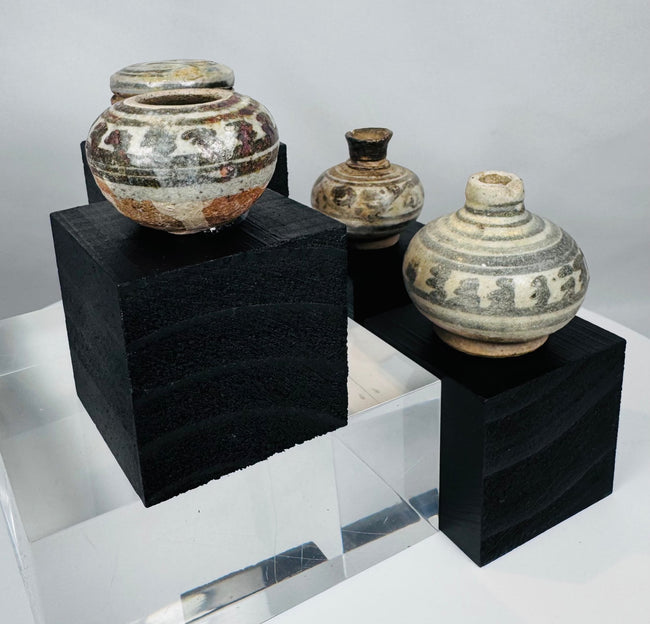 Rare collection of miniature Sawankhalok ceramics illustrating the craftsmanship and trade networks of medieval Southeast Asia.