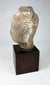 Southeast Asian Buddhist sculpture showing a terracotta Buddha head influenced by Gupta art