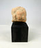 Gandharan terracotta fragment featuring central male figure and side figures