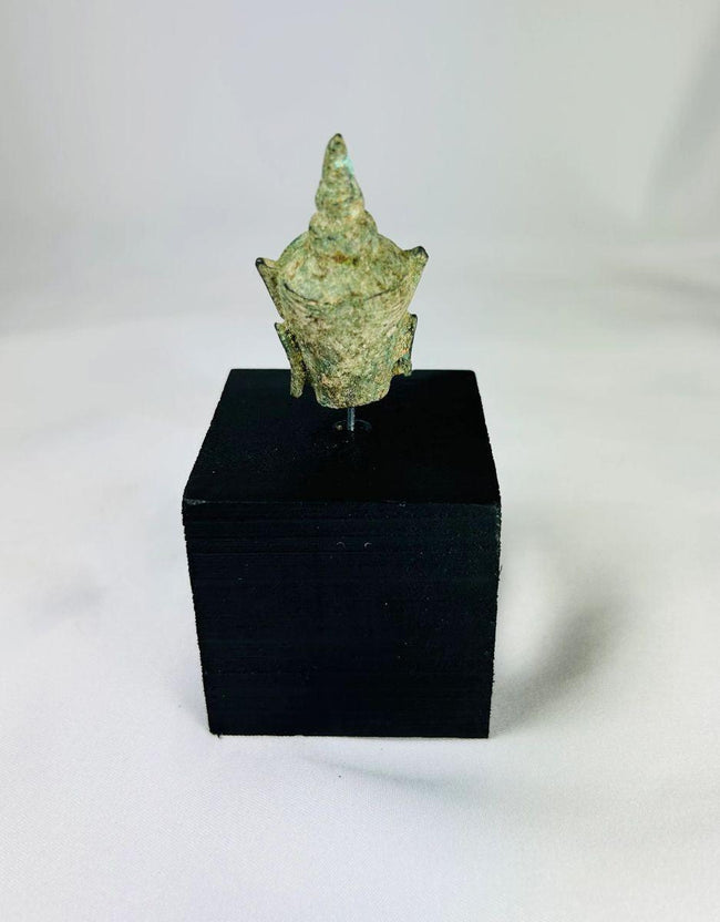 Antique bronze Buddha head elongated earlobes pointed ushnisha green patina