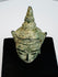 Early Southeast Asian Buddhist devotional sculpture with serene Buddha face and aged green bronze surface