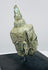 Small bronze Buddha head artifact from Southeast Asia with traditional Buddhist iconography and natural patina