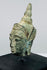 Southeast Asian Buddhist bronze artifact with serene expression, green patina, and symbolic ushnisha
