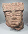 Classic Veracruz stone sculpture with a broad stepped headdress