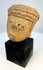 Pre-Columbian shaft tomb culture ceramic head fragment front view