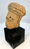 Antique terracotta figurine head from ancient West Mexico archaeology