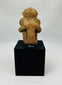 West Mexico shaft tomb terracotta sculpture showing contemplative seated posture and reddish clay surface