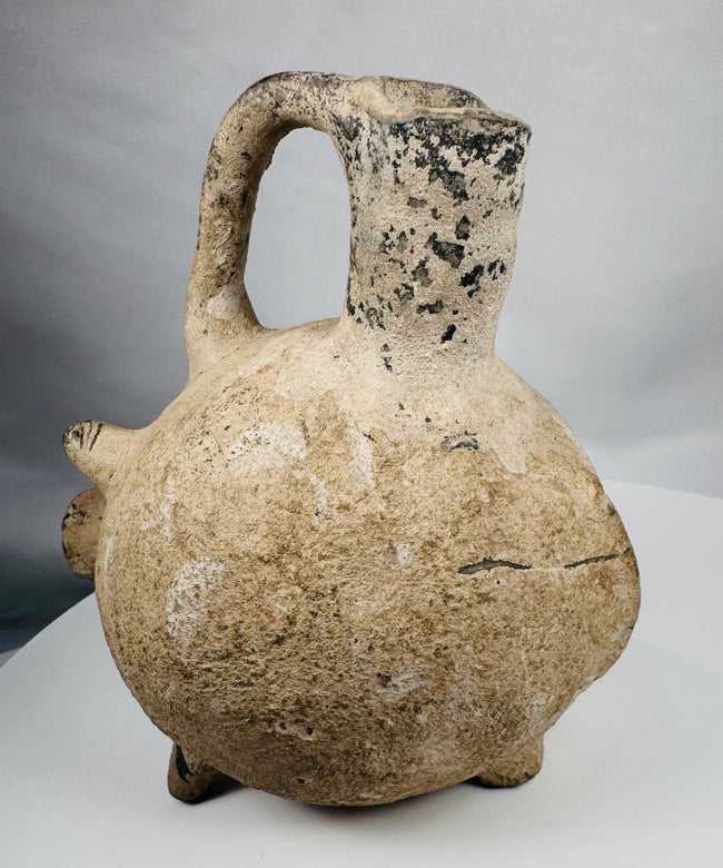 Hand-modeled terracotta zoomorphic vessel in the form of a pig from the Yortan Culture of ancient Anatolia.