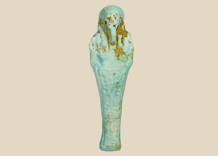 Ancient Egyptian faience ushabti with turquoise-blue glaze, finely modeled facial features, circa 700–300 BCE.