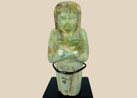 Ancient Egyptian faience ushabti figure with blue-green glaze and black painted details