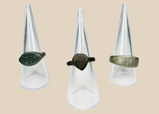 Set of three ancient European bronze finger rings with aged patina
