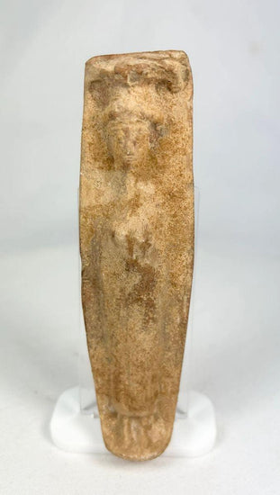 Ancient Roman fertility pottery figure, circa 1st–3rd century CE, carved terracotta form with faint human features and aged surface patina.