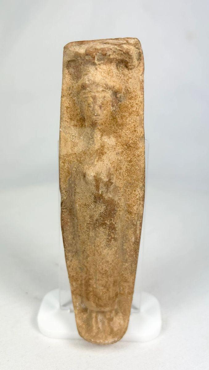 Ancient Roman fertility pottery figure, circa 1st–3rd century CE, carved terracotta form with faint human features and aged surface patina.