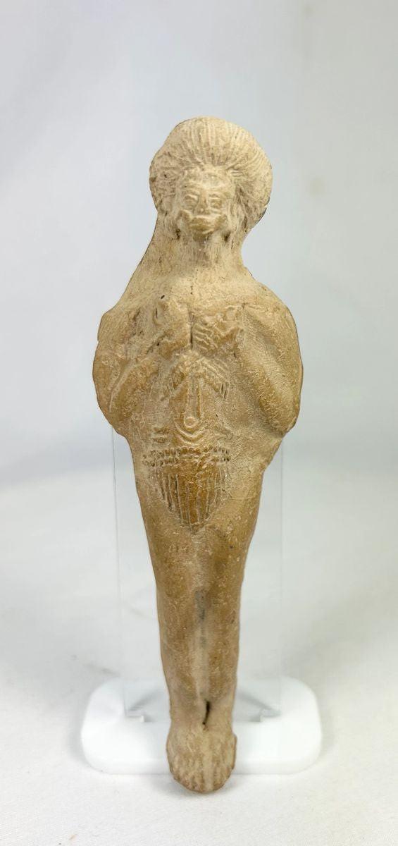 Roman terracotta fertility figure, 1st–3rd century CE, with raised arms, incised detailing, and aged earthen patina.
