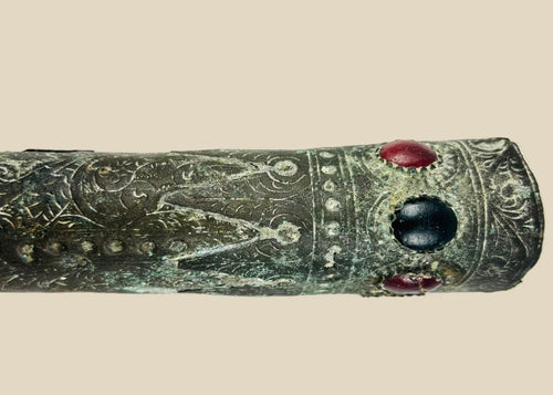 Dense, smooth, spherical stone object from ancient South Asia, likely used as a grinding or pounding tool, circa 2nd millennium BCE, showing natural patina and wear.