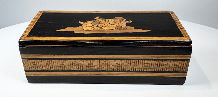 Anglo-Indian marquetry keepsake box showing black lacquered lid and patterned wood sides