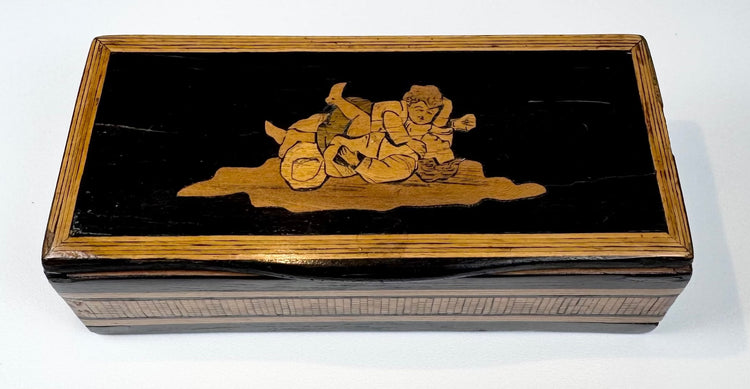 Anglo-Indian marquetry keepsake box with geometric wood mosaic banding, three-quarter view