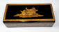 Top view of Anglo-Indian marquetry box showing reclining figural wood inlay and decorative borders