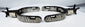 Silver-inlaid antique ranching spurs with geometric decoration and steel rowels