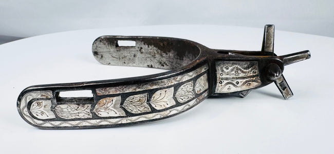 Pair of vintage cowboy spurs from the American West, circa 1900–1950