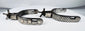 Early 20th-century American cowboy spurs with silver decoration and aged patina