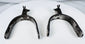 Historic Western equestrian spurs with engraved mounts and five-point rowels