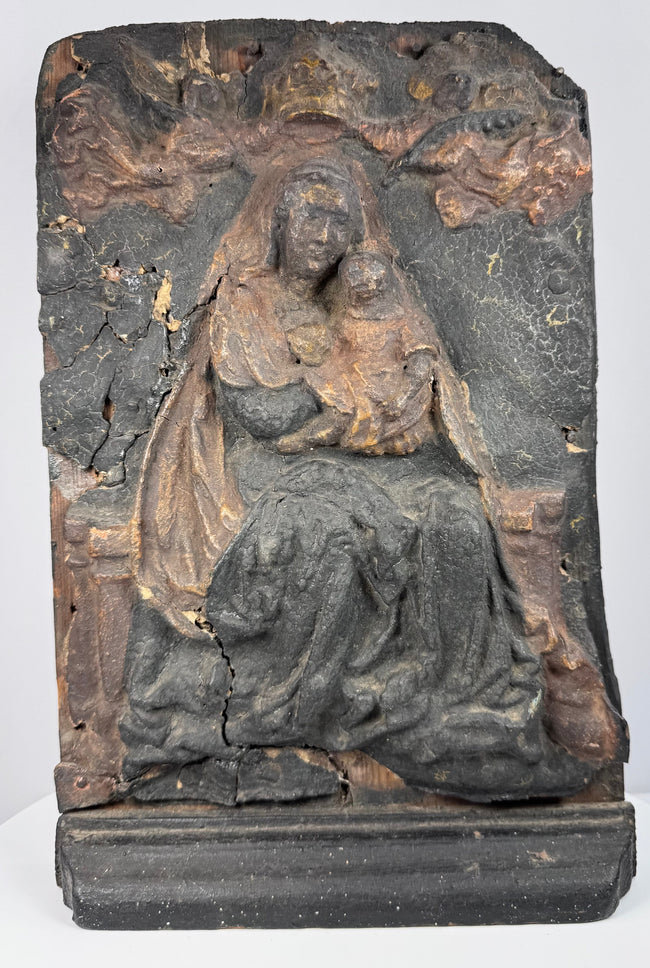 Polychrome wooden Virgin and Child devotional panel with surviving red, ochre and gold-colored decoration