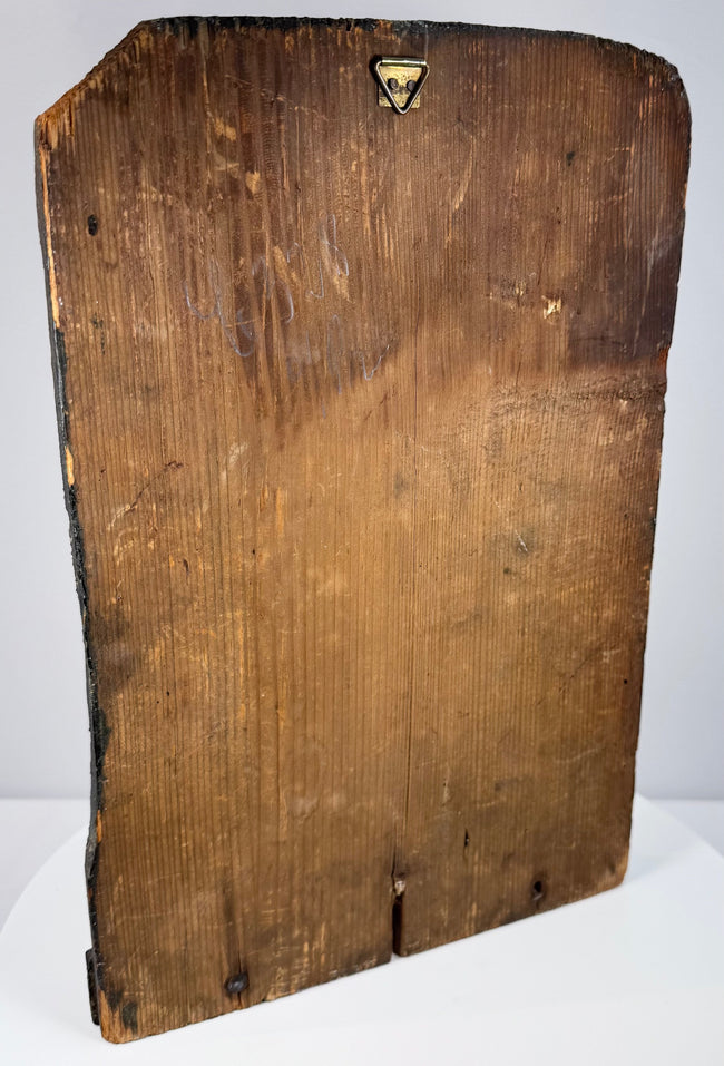 Lower section of antique religious relief showing projecting molded ledge, historic cracks and areas of pigment loss