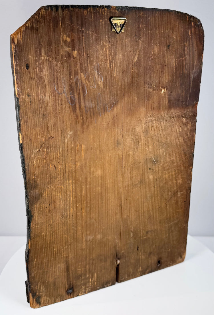 Lower section of antique religious relief showing projecting molded ledge, historic cracks and areas of pigment loss
