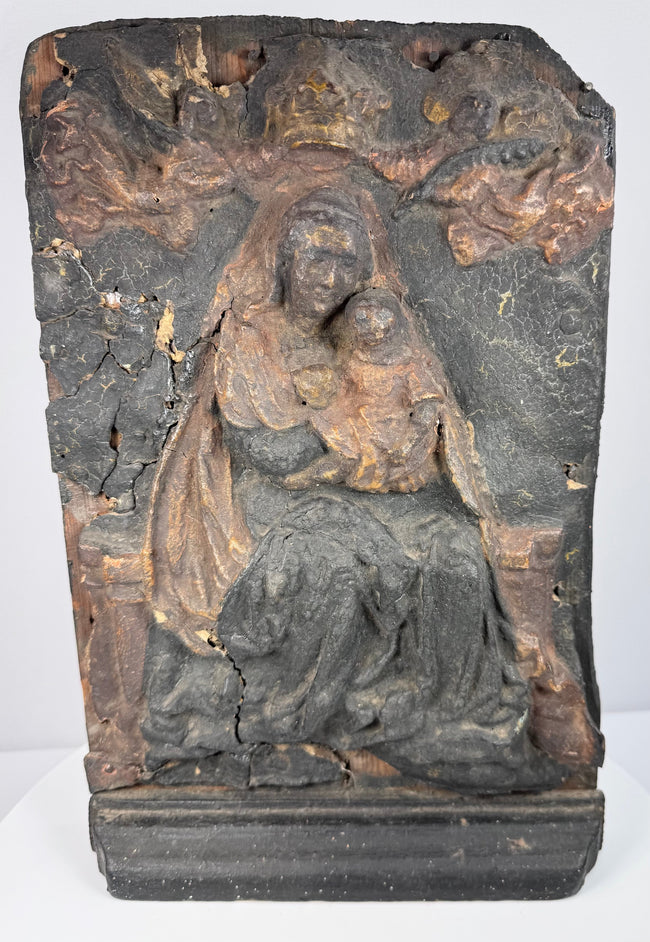 Baroque Marian relief showing the Virgin enthroned with Christ Child beneath a crown supported by two winged angels