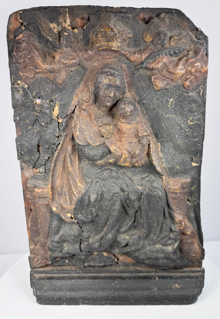 Baroque Marian relief showing the Virgin enthroned with Christ Child beneath a crown supported by two winged angels