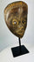 Classic Baule mask exemplifying balance and idealized beauty in West African art
