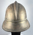 German brass Feuerwehrhelm showing rounded side profile and historic surface wear, circa 1908–1934