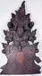 Reverse of 19th-century carved furniture crest showing mounting holes, screws, old attachment points and original construction evidence