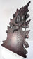 Antique carved wood pediment with chips, cracks, historic repairs, exposed fasteners and richly aged reddish-brown finish