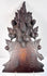 Detail of antique fruit basket carving with deeply incised crosshatching, projecting leaves and aged dark-stained wood